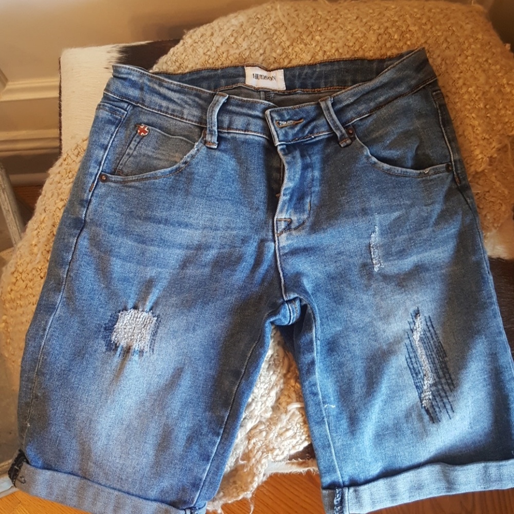Distressed blue jean shorts